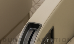 Extreme close up of chair controls in refurbished Falcon 2000