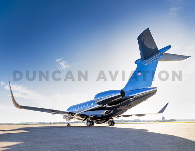 View from rear of Embraer EMB500 with new paint in shades of blue