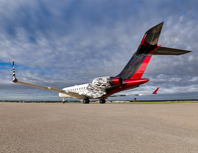 Tail view of newly painted Global with custom black and red scheme