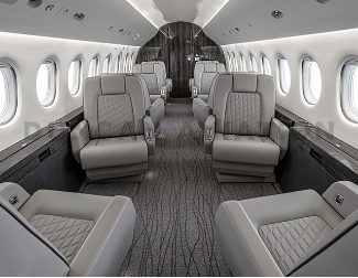 Dove gray club seats with custom stitching on Falcon 2000 interior refurbishment
